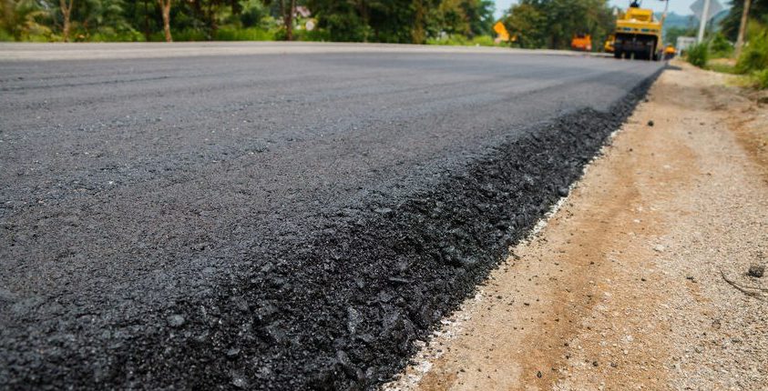 Why is soil stabilization essential when building roads?